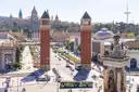 Plaça d'Espanya in Barcelona from above, with its two brick towers and the avenue leading up to the palace on Montjuïc