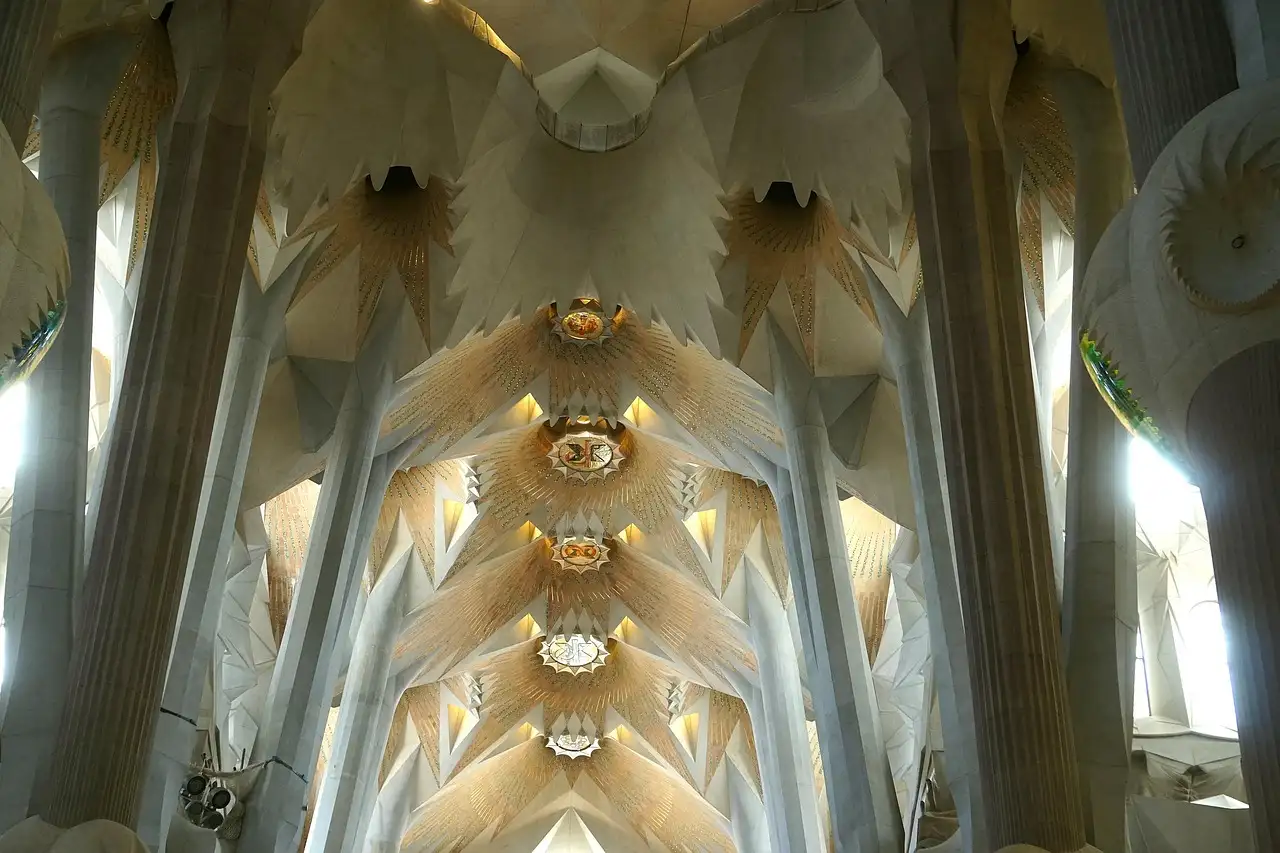 The white tree-like columns and star-shaped vault inside the Sagrada Família