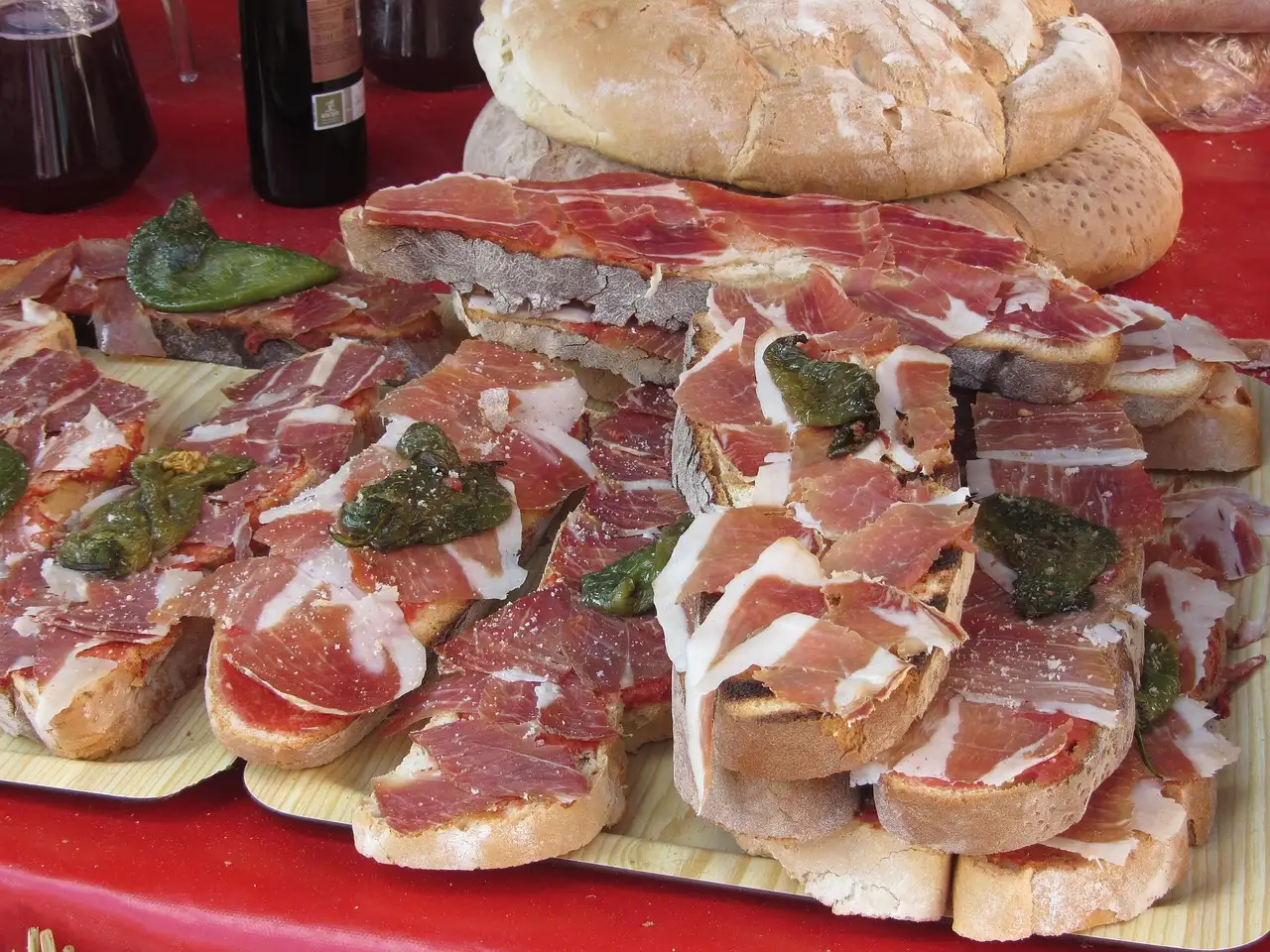 Toasted bread slices topped with Spanish cured ham