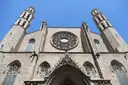 The Gothic front of Santa Maria del Mar church in El Born, with its round rose window